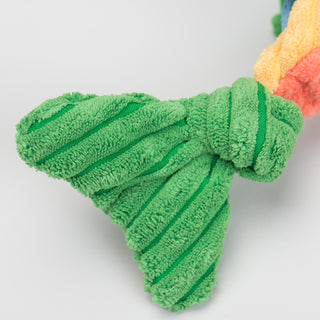 Close up of knotted green corduroy tail fin