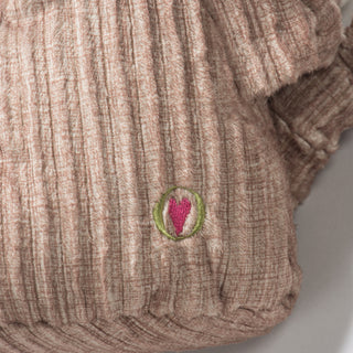 Close up image of the HuggleGroup Heart on Stuey's back.