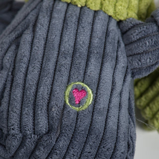 Close up of HuggleHeart logo of toy.