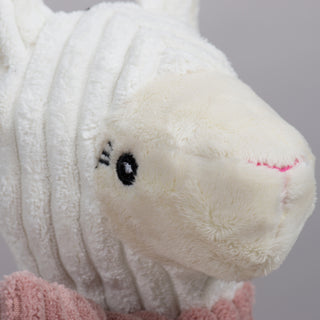 Close up of Lillie Llama's face to show detail in face embroidery.