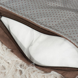 Close-up view of the inner lining of a soft, durable gray couch and bed protector. The woven texture of the fabric is clearly visible, highlighting its strength and quality.