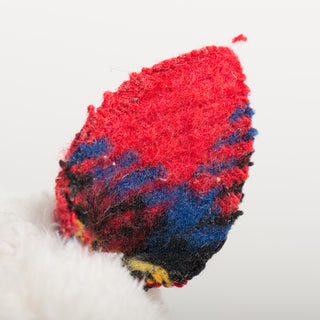 Detailed close-up of a single tartan plaid mouse ear from the HuggleKats toy.