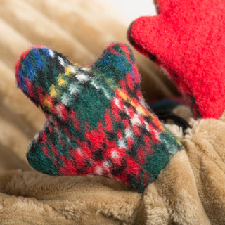 Close-up of the Reindeer Squooshie's plaid and red felt antlers, showing festive texture and color detail.