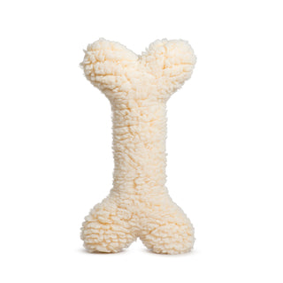 Reverse side of the bone-shaped dog toy fully covered in cream-colored HuggleFleece® plush fabric.