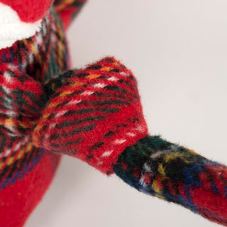 Close-up of knotted limb on Tartan Tidings Fox Knottie® showing plaid texture