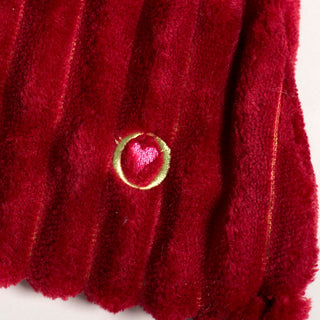 Back view of St. Nick HuggleFlattie showing hat and pink heart embroidery.