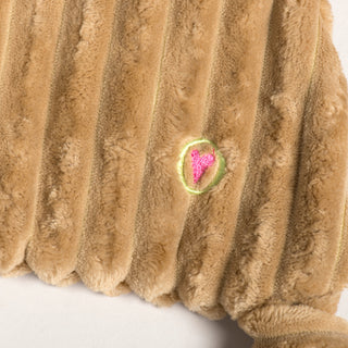 Close-up of tan corduroy reindeer dog toy showing the embroidered pink heart, signature of HuggleHounds.