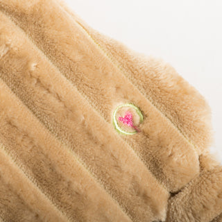 Heart embroidery stitched into tan corduroy body of Rudy Reindeer HuggleFlattie.