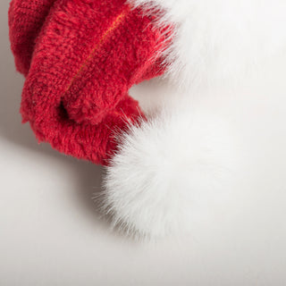Close-up of Santa hat with white plush pom-pom from St. Nick HuggleFlattie.