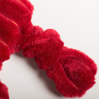 Knotted red plush corduroy limb from St. Nick HuggleFlattie.