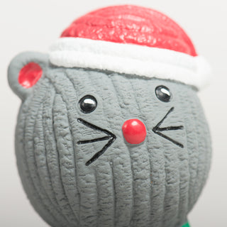 Close-up of a gray Ruff-TexÂź mouse toy with a red nose and Santa hat.