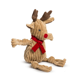 Left side view of Rudy Reindeer Knottie sitting, highlighting floppy limbs and facial features.