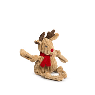 Left side view of Rudy Reindeer Knottie sitting, highlighting floppy limbs and facial features.