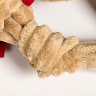 Knotted corduroy limb of Rudy Reindeer Knottie dog toy, highlighting the soft and durable fabric.