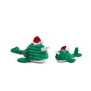 Side-by-side image of large and small Noe Narwhal Knottie® plush dog toys with red Santa hats.