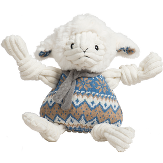 Stuffed animal lamb toy with a knitted sweater on a white background