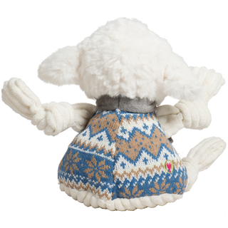 White plush lamb toy with a patterned sweater on a white background