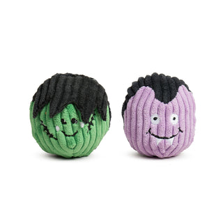 Side-by-side view of vampire and Frankenstein Halloween cat toy balls