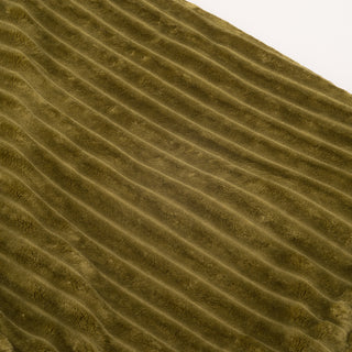 Close up view of olive colored blanket.