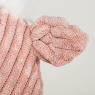 Close up of dusty pink corduroy ear on Penelope Pig Fluffer Long & Lovelie™.