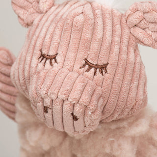 Close up of brown embroidery facial details on Penelope Pig Fluffer Long & Lovelie™.