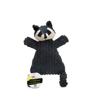 Dark gray triangle shaped raccoon corduroy plush dog toy with white face, black inner ears and around eyes, dark gray strip down forehead, knotted legs, short stubby arms, and brown embroidered eyes with tag.