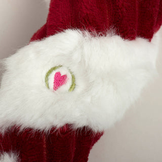 Close up of HuggleHeart logo to show fabric texture of Candy Cane dog toy.