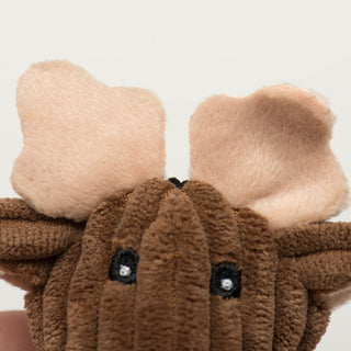 Close up of reindeer Wee Huggle's tan antlers and embroidered eyes to show details.