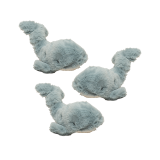 Set of three tiny whale plush dog toy designed for pint-sized pups with gray fuzzy faux-fur body, knotted tail, embroidered brown and black eyes, and white corduroy belly.