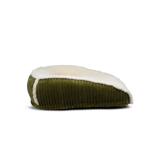 Side view of olive green bed showing corduroy fabric and details.