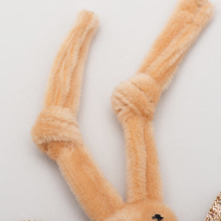 Close up image of beige knotted antennae.