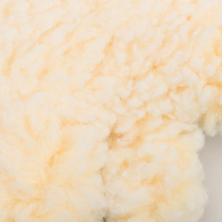 Close up image of HuggleFleece® texture on shamrock durable plush dog toy.