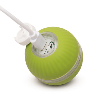 Showing soft white on/off/mode button opened up with charging cord plugged into the PlayKat™