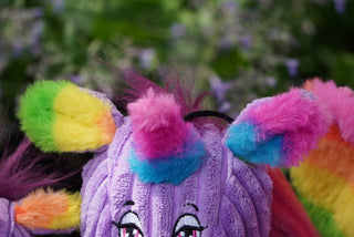 Close up of rainbow faux-fur on horn and ears to show detail.