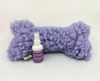 Toy and lavender calming spray set: lavender colored HuggleFleece® bone plush dog toy with squeaker and calming lavender spray.