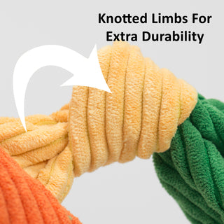 Close up of knotted limb of Knottie® durable plush dog toy with text "Knotted Limbs For Extra Durability"