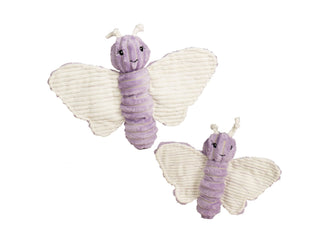 Two purple butterflies with white wings and antenna. The purple is very rich and soft looking, it is a light violet color. The inside of the wings is white corduroy plush with purple stitching. The eyes are black with white pupils and long eyelashes. The butterflies have a slight smile.