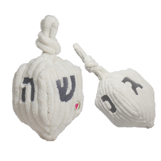Oh Dreidel Plush white dog toy, large and small sizes side-by-side, featuring soft corduroy fabric and embroidered Hebrew letters.