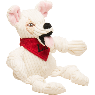 Side view of Chihuahua mix durable plush corduroy dog toy: has white fur, pink inner-ear, beige outer-ear, black eyes, white pupils, plush-out black nose, black mouth, pink tongue, wearing a red bandana with the initials "L.T", white fur, white furred knotted limbs, and is squeaky.