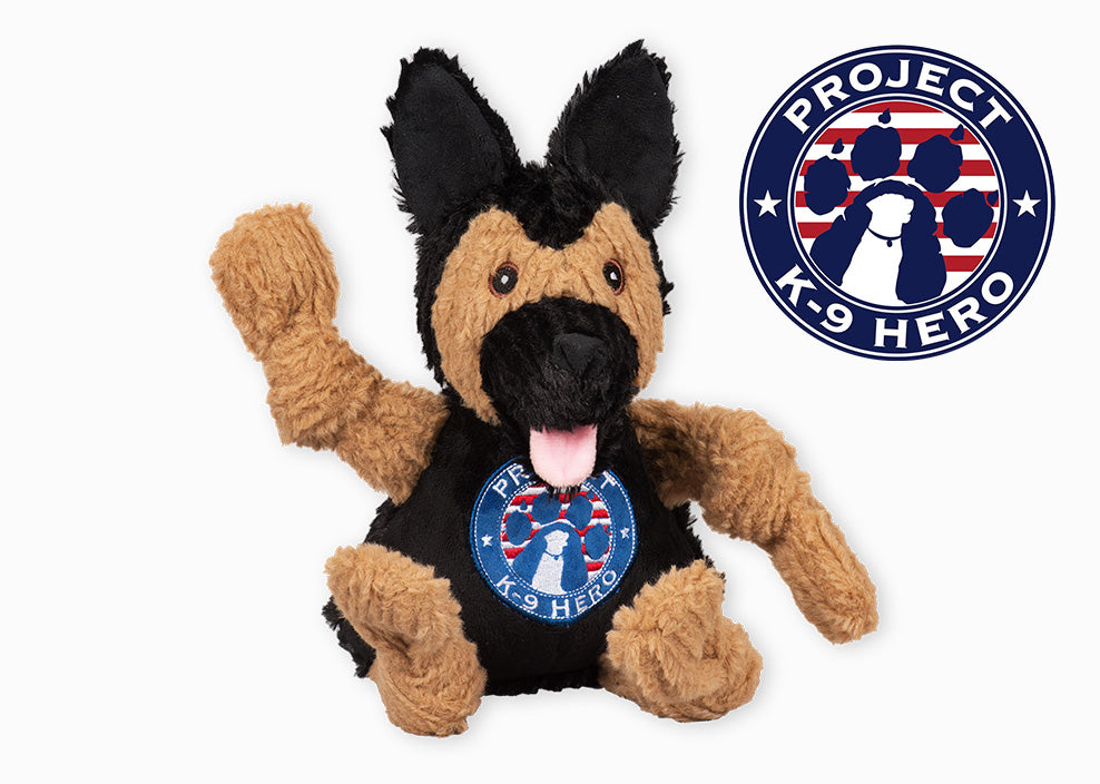 Project K-9 Hero logo next to black and tan plush Knottie® dog.