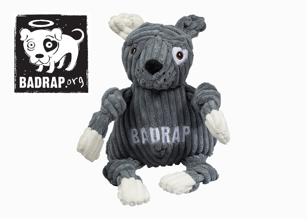 BadRap logo next to gray and white plush Knottie® dog.