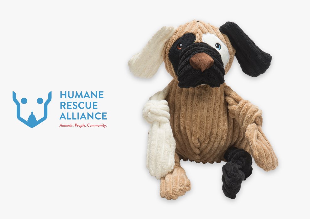 Humane Rescue Alliance logo next to tan, black, and white Patches plush Knottie® dog.