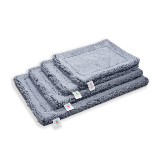 Stack of gray colored mats in various sizes.
