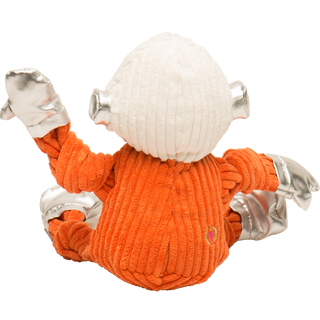Back view of Astronaut plush dog toy in orange suit, white helmet, and silver gloves and boots.