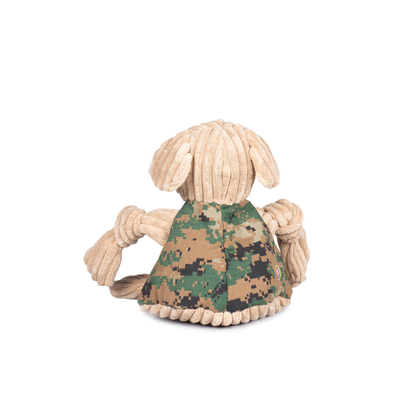 Back view of Warrior Canine Connection Tommy ll Lab Knottie- Yellow/Tan corduroy head and limbs, with camo body. Camo body has white Warrior Canine Connection logo on it. Floppy ears, black nose, and brown eyes.