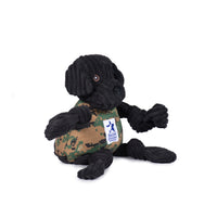 Side view of Warrior Canine Connection Luke Lab Knottie. Black corduroy head and limbs, with brown open eyesand floppy ears. Camo body, with white Warrior Canine Connection logo in the middle. Thumbnail