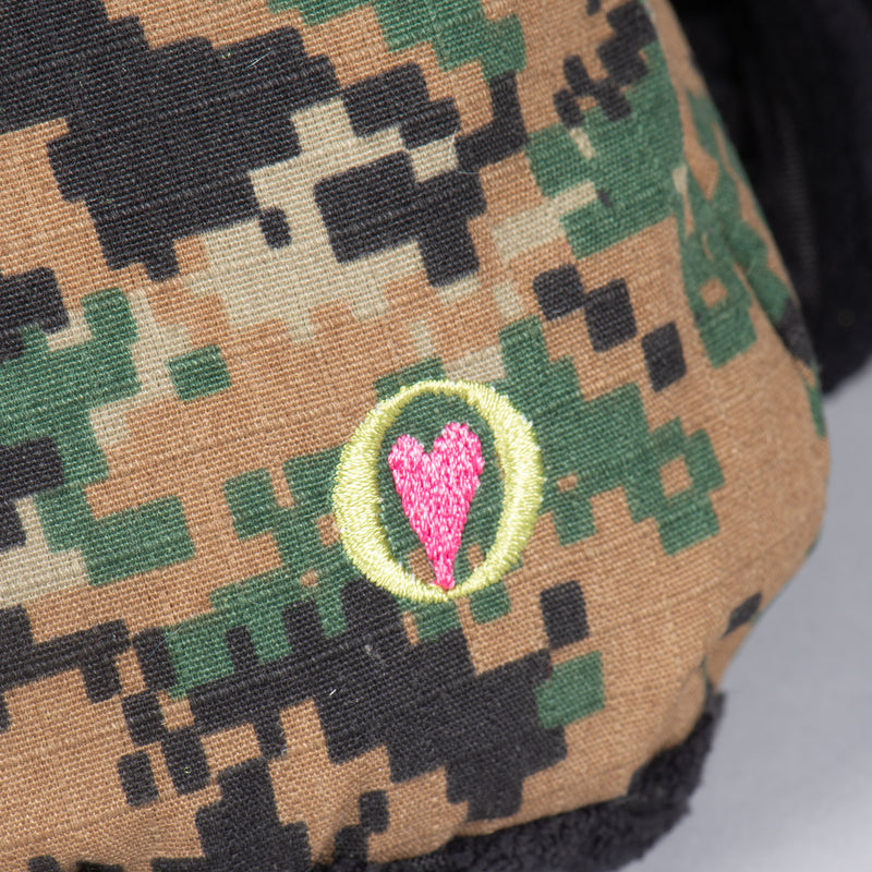 Close up of HuggleHeart on camo body.