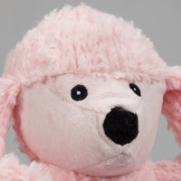 Close up of Diva Pink Poodle Knottie's face. Pink furry face with black nose. Black eyes with white pupils. Thumbnail