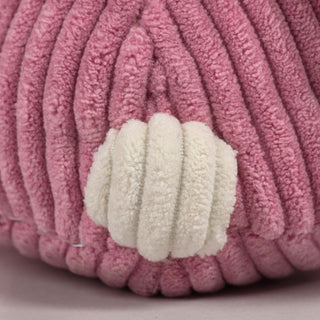 Close up of white tail pouf of pink bunny durable plush corduroy dog toy.