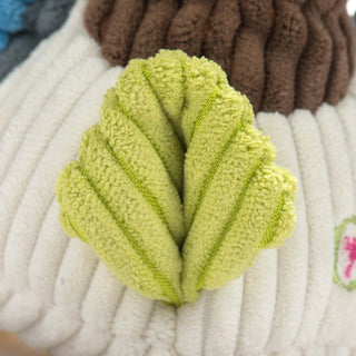 Close up of green tail on duck durable plush corduroy dog toy.